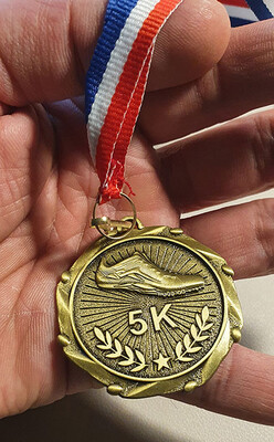 medal-in-hand.jpg